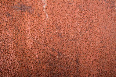 Arka plan, eski metal plaka pas ile kaplıdır