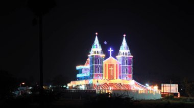 Vijayawada, INDIA - December 29 2015 :Illuminated church during Christmas time near Vijayawada,India clipart