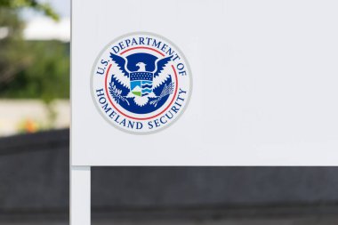 Troy, MI, USA - August 11, 2025: Border Protection sign for US. Department of Homeland Security on white board.