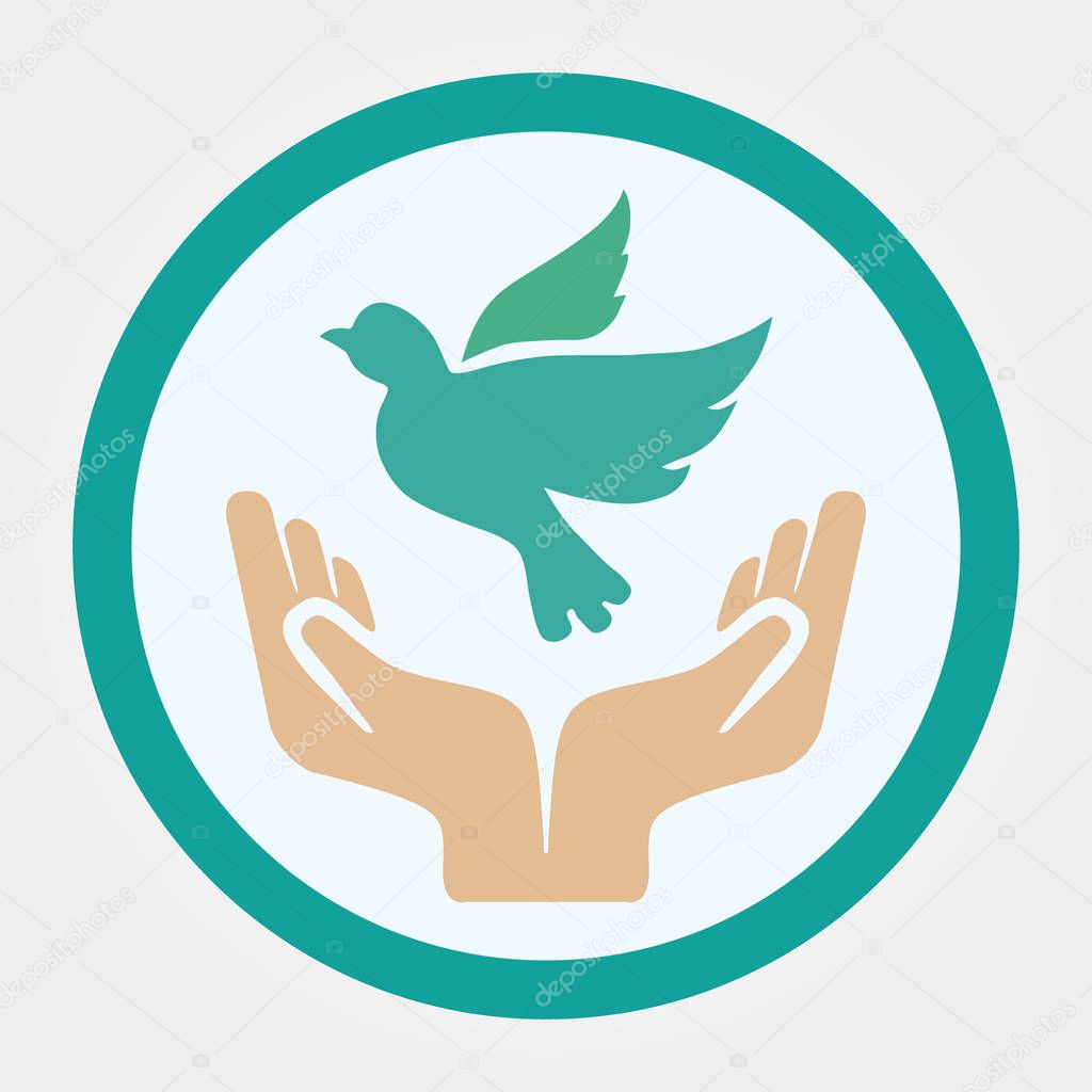 Concept of world without war hands and dove. Symbols for the International Day of Peace