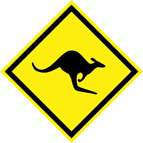 Желтый знак опасности с кенгуру на дороге — стоковое фото