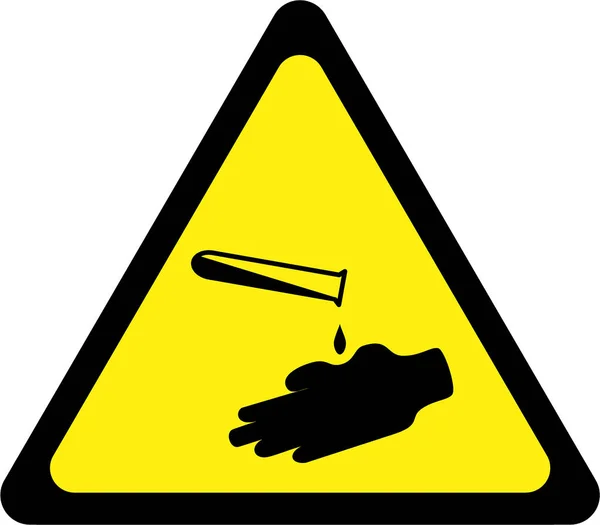 Жовтий знак попередження з корозійними речовинами — стокове фото