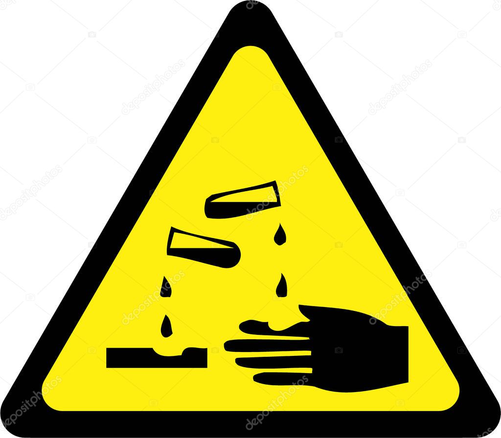 Yellow warning sign with corrosive substances symbol