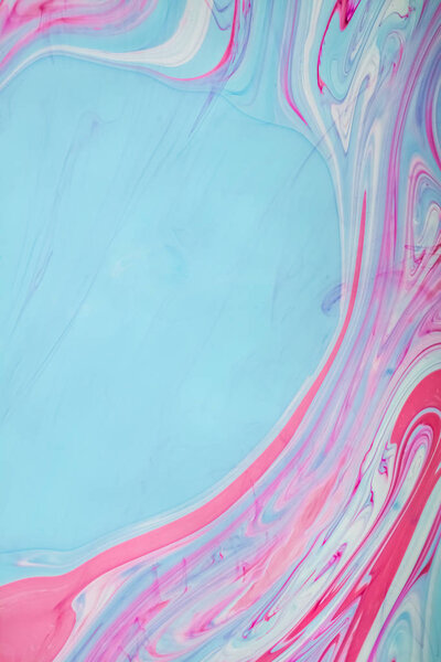 Abstract colored background. Stains of paint on the water. Ebru art, marbled paper.