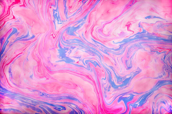 Abstract colored background. Stains of paint on the water. Ebru art, marbled paper.