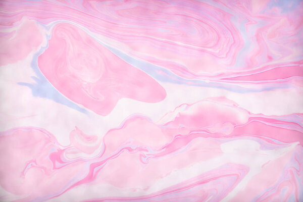 Abstract colored background. Stains of paint on the water. Ebru art, marbled paper.