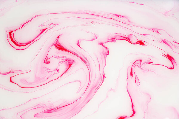 Abstract colored marble background. Stains of paint on the water.