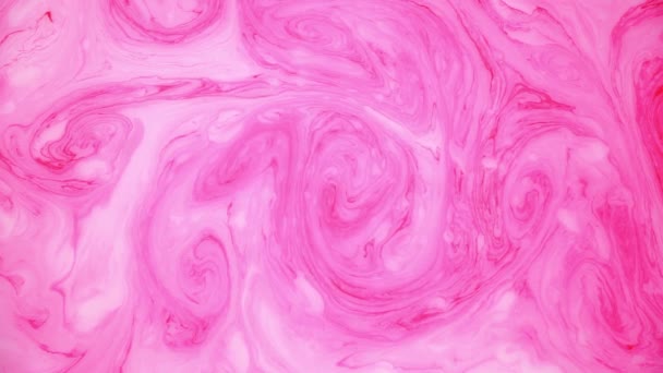 水の上のピンクのインクの汚れ。抽象的な背景映像. — ストック動画