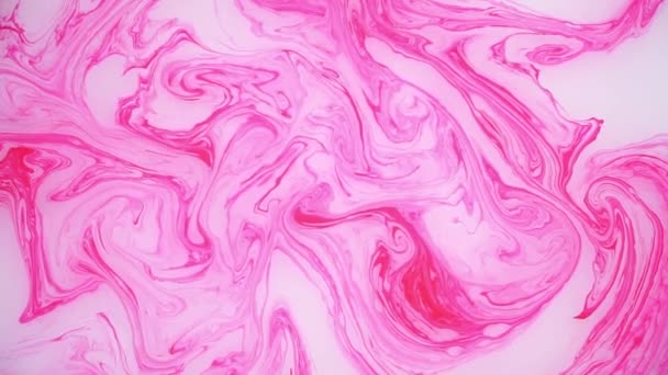 Λεκέδες από ροζ μελάνι σχετικά με το νερό. Αφηρημένα φόντο σκηνές. — Αρχείο Βίντεο