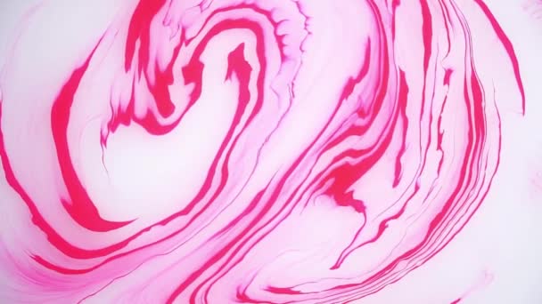 水の上のピンクのインクの汚れ。抽象的な背景映像. — ストック動画