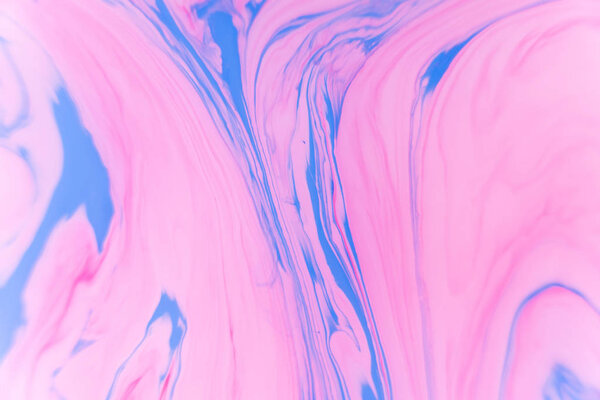 Abstract violet marble background. Stains of paint on the water.