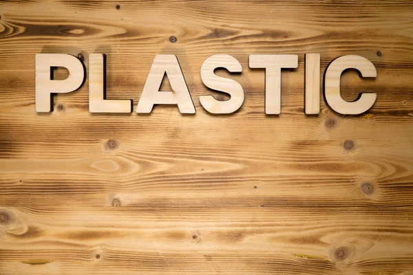 Plastikwort Aus Holzblock Buchstaben Auf Holzbrett — Stockfoto
