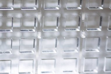 Yüksek teknoloji arka plan. Şeffaf plastik ya da cam delik dışarı kesim ile bir sayfası. Lazer kesim pleksiglas.