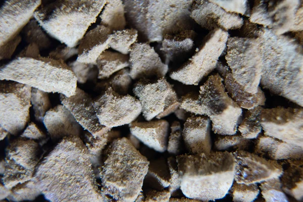 Ułożone granulat tekstura tło. Kawa rozpuszczalna zbliżenie tła makro — Zdjęcie stockowe