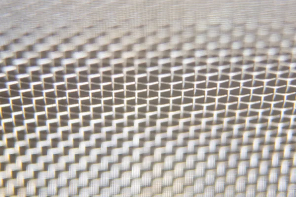 Metal wire mesh background or texture. Closeup, macro.