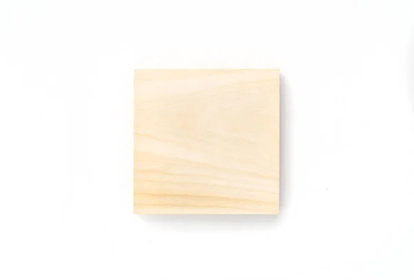 Quadrado de madeira sobre fundo branco. Peça de madeira close-up, vista superior, isolado . — Fotografia de Stock