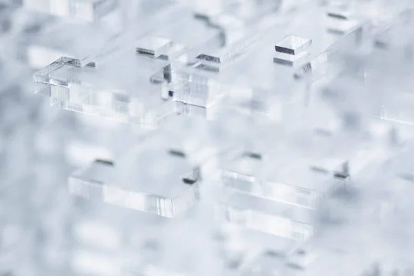 Abstrakter Hightech-Hintergrund. Details aus transparentem Kunststoff oder Glas. Laserschneiden von Plexiglas. — Stockfoto
