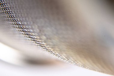 Metal tel kafes arka plan veya doku yuvarlak. Yakın çekim, makro.