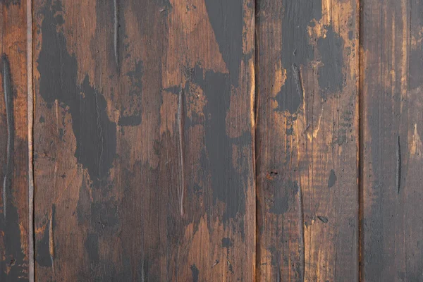 Old wooden surface background, scuffed boards with black paint stains. — Stock Photo, Image