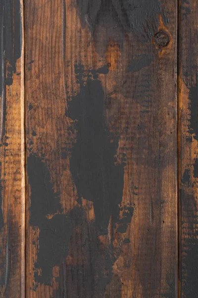 Fondo de superficie de madera vieja, tablas rayadas con manchas de pintura negra . —  Fotos de Stock
