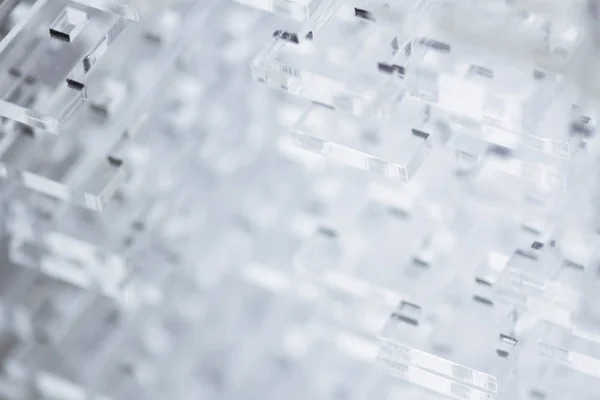 Abstrakter Hightech-Hintergrund. Details aus transparentem Kunststoff oder Glas. Laserschneiden von Plexiglas. — Stockfoto