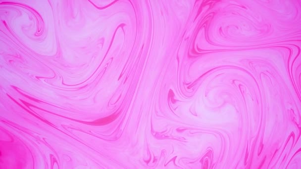 Flecken rosa Tinte auf dem Wasser. Abstraktes Hintergrundmaterial. — Stockvideo