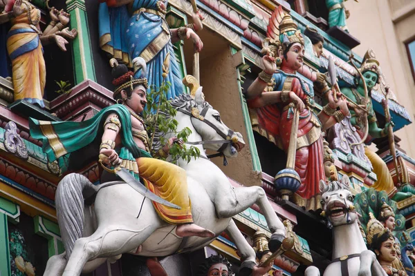 Hindu dieties statues in the shrine. Religious decoration of the temple in Kuala Lampur, Malaysia. — Stock Photo, Image