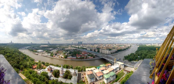 Panoramic view of Moscow with Luzhniki Stadium, Sparrow Hills, Moscow University, Moscow River, Saint Andrew\'s Monastery, Neskuchny Garden taken from the building of the russian academy of sciences (Golden Brains)