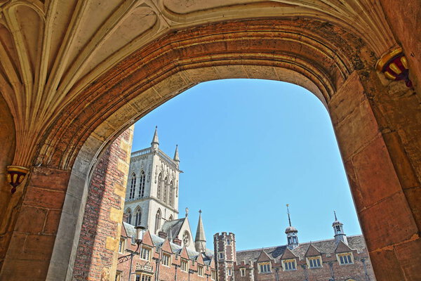 CAMBRIDGE, UK - MAY 6, 2018: St John's College University, the Second Court viewed through an arch, with St John's college Chapel in the background