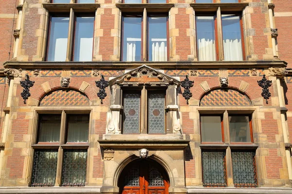 Close-up on the external facade of the old Ministry of Justice (built between 1876 and 1883), located on Plein Square, with details of the carvings, The Hague, Netherlands