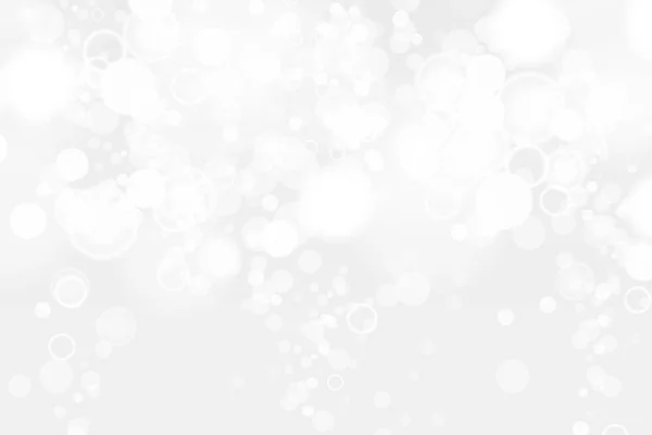 Ασημί και λευκές bokeh φώτα defocused. Αφηρημένα φόντο. Κομψό, λαμπρό, θολωμένη ανοιχτόχρωμο φόντο. Μαγικό χριστουγεννιάτικο φόντο. EPS 10. — Διανυσματικό Αρχείο