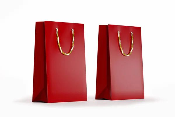 La bolsa roja se burla. Bolsa de papel de lujo aislada sobre fondo blanco. renderizado 3d —  Fotos de Stock