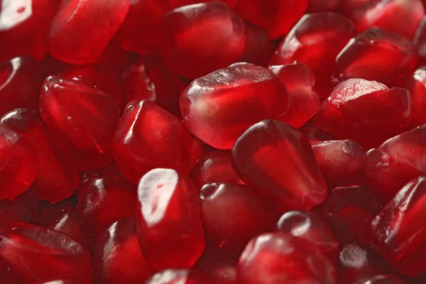 Fondo rojo de granadas rojas de grano. Granets rojos grandes maduros o Ga — Foto de Stock