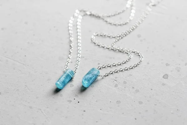 Crystal blue aquamarine beryl on a silver chain. Pendant aquamar