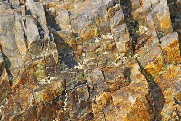 背景石。橙色、米色或黄色石材,背景. — 图库照片