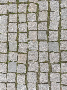 Kaldırım taşlarından yol, doku taşları, eski taşların arka planı