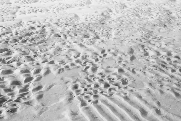Fundo cinzento. Fundo de areia. Belas ondas e areia du — Fotografia de Stock