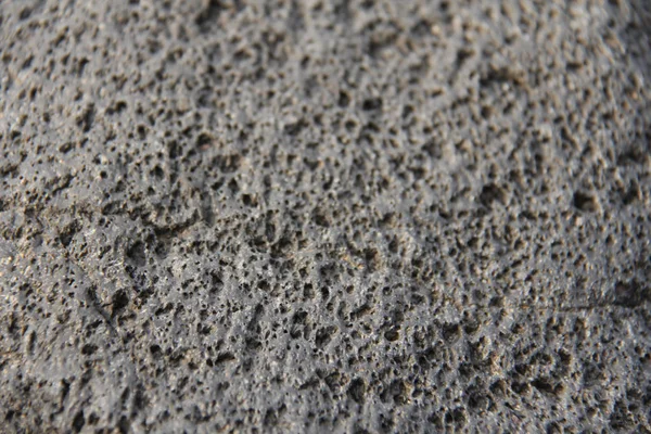 Тло сірих каменів вулканічного лави. Сірий фон. — стокове фото