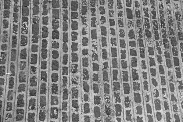 Vieux pont pavé de briques. Vieux fond gris. Contexte de t — Photo