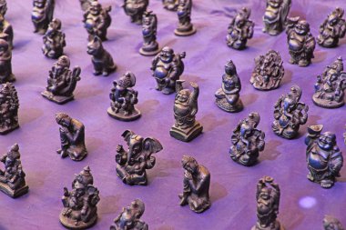 Buda, Ganesha, Çarşı pazarında Kurbağa küçük heykelcikler