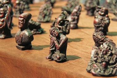 Buda, Ganesha, Çarşı pazarında Kurbağa küçük heykelcikler