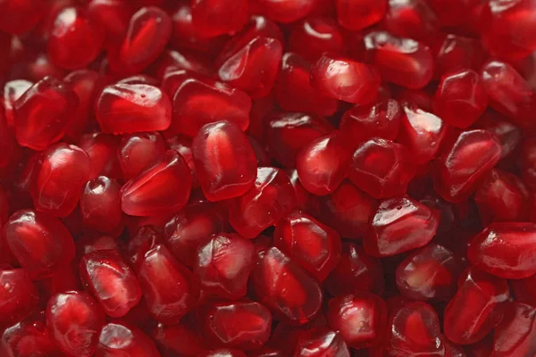 Fondo rojo de granadas rojas de grano. Granets rojos grandes maduros o Ga — Foto de Stock