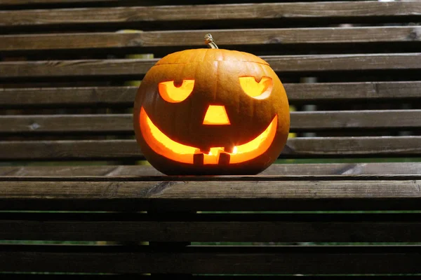 Halloween Pumpkins head. Orange pumpkin with a smile and eyes on