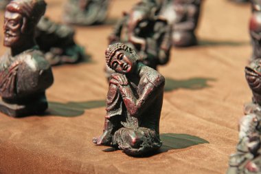Buda, Ganesha, Çarşı pazarında Kurbağa küçük heykelcikler