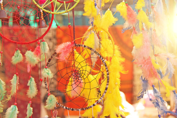 Bright colored dream catchers from the feather. Gift souvenir In