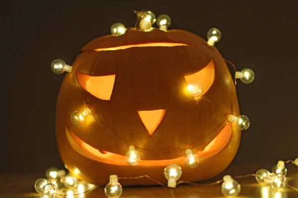 Halloween Pumpkins head. Orange pumpkin with a smile and glowing