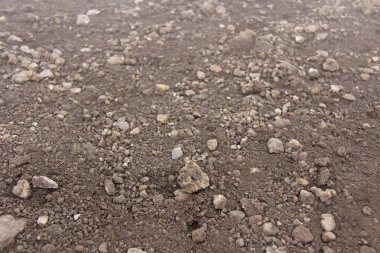 Küçük Taşların arka planı. Etna Dağı'ndan taşlar. Ada o