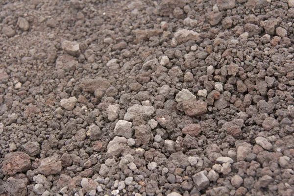 Фон маленьких камней. Камни с горы Этна. Остров о — стоковое фото