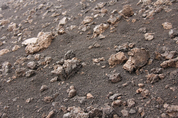 Background of Small Stones. Stones from Mount Etna. The island o