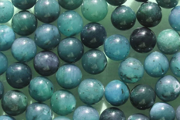 Natural blue mineral stones beads. Blue natural background made